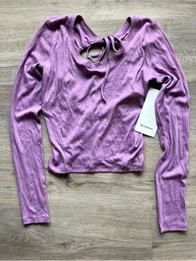 Lululemon Lavender Open Back Ribbed
Long Sleeve Shirt. Size 8, NWT